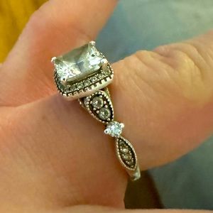 2.5 carat princess-cut ring set is framed in a bead set halo Custom Vancaro Ring